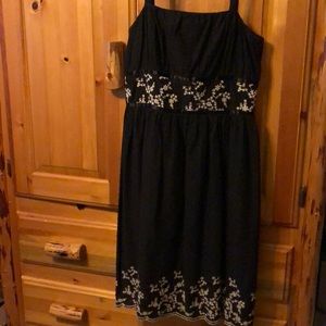 Cute, flirty LBD with floral accent!